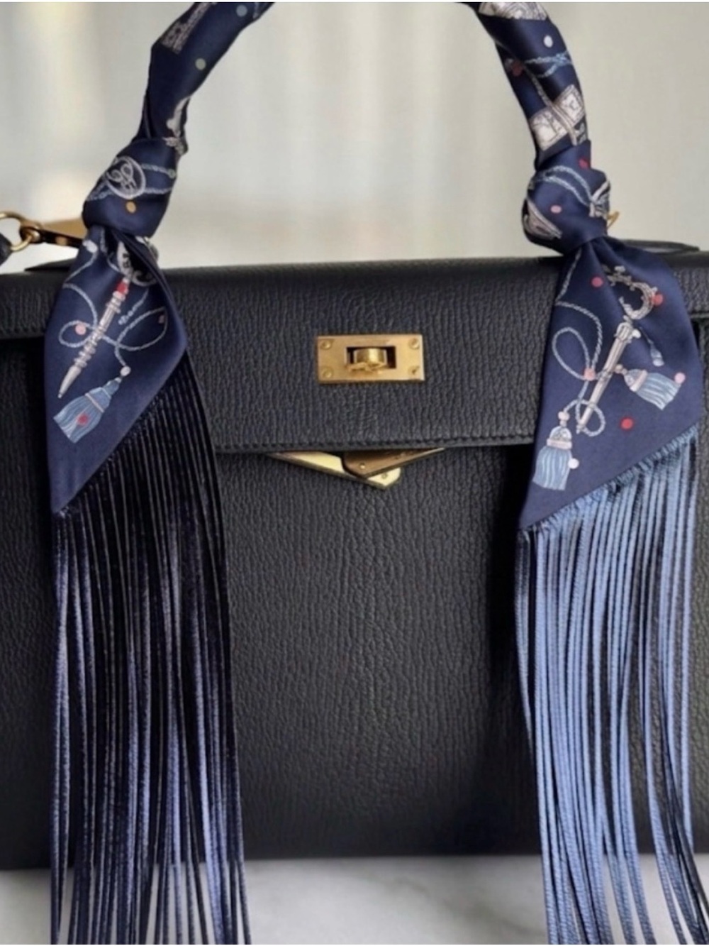 Hermes Navy Key & Chain Print Silk Twilly with leather Fringe comes with a box